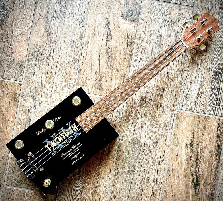 A photo of a Cigar Box Uke created by Ray Riordan