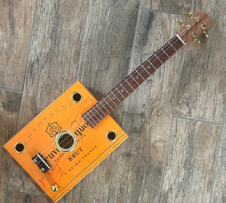 A photo of a Cigar Box Uke created by Ray Riordan