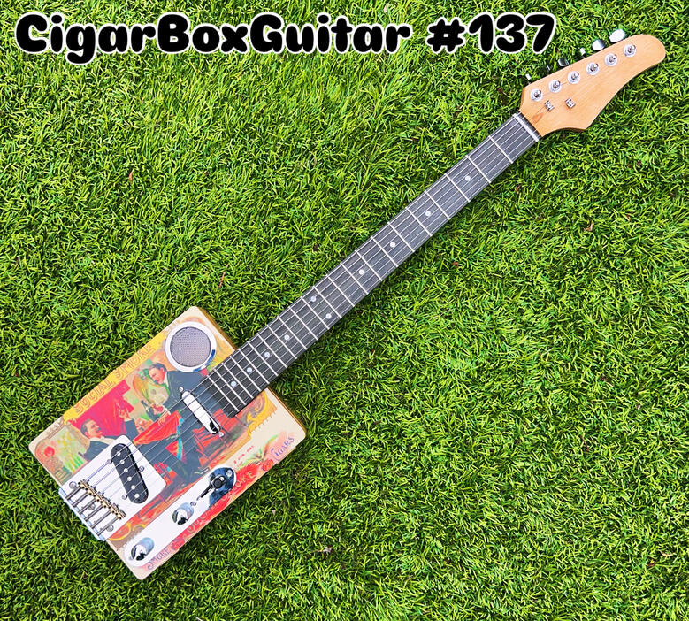 A photo of a Cigar Box Guitar created by Ray Riordan