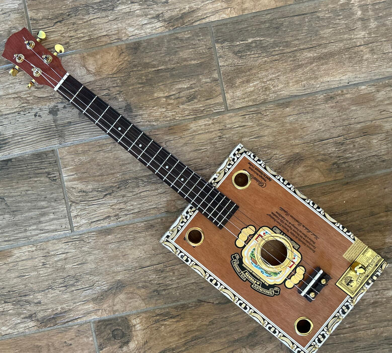 A photo of a Cigar Box Uke created by Ray Riordan