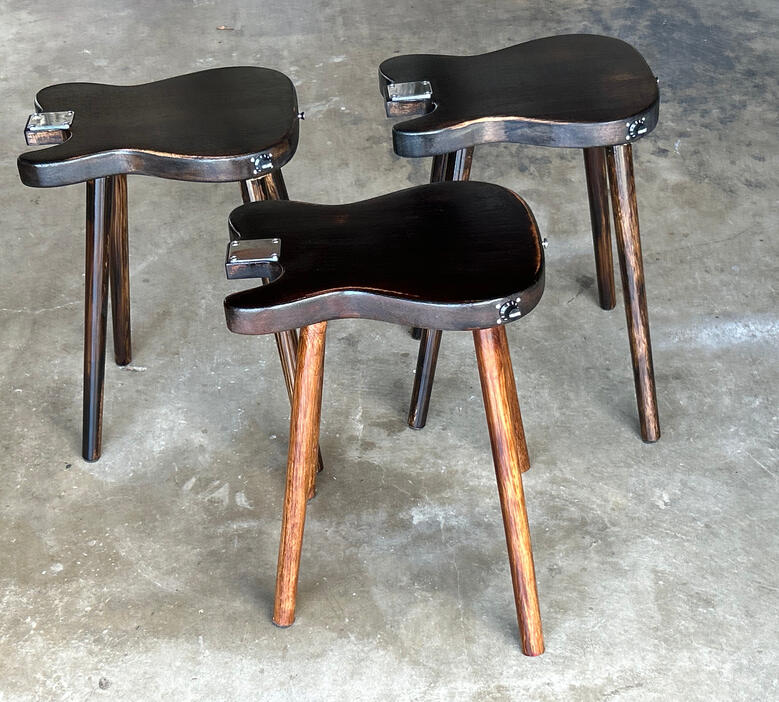 A photo of 3 guitar tables created by Ray Riordan